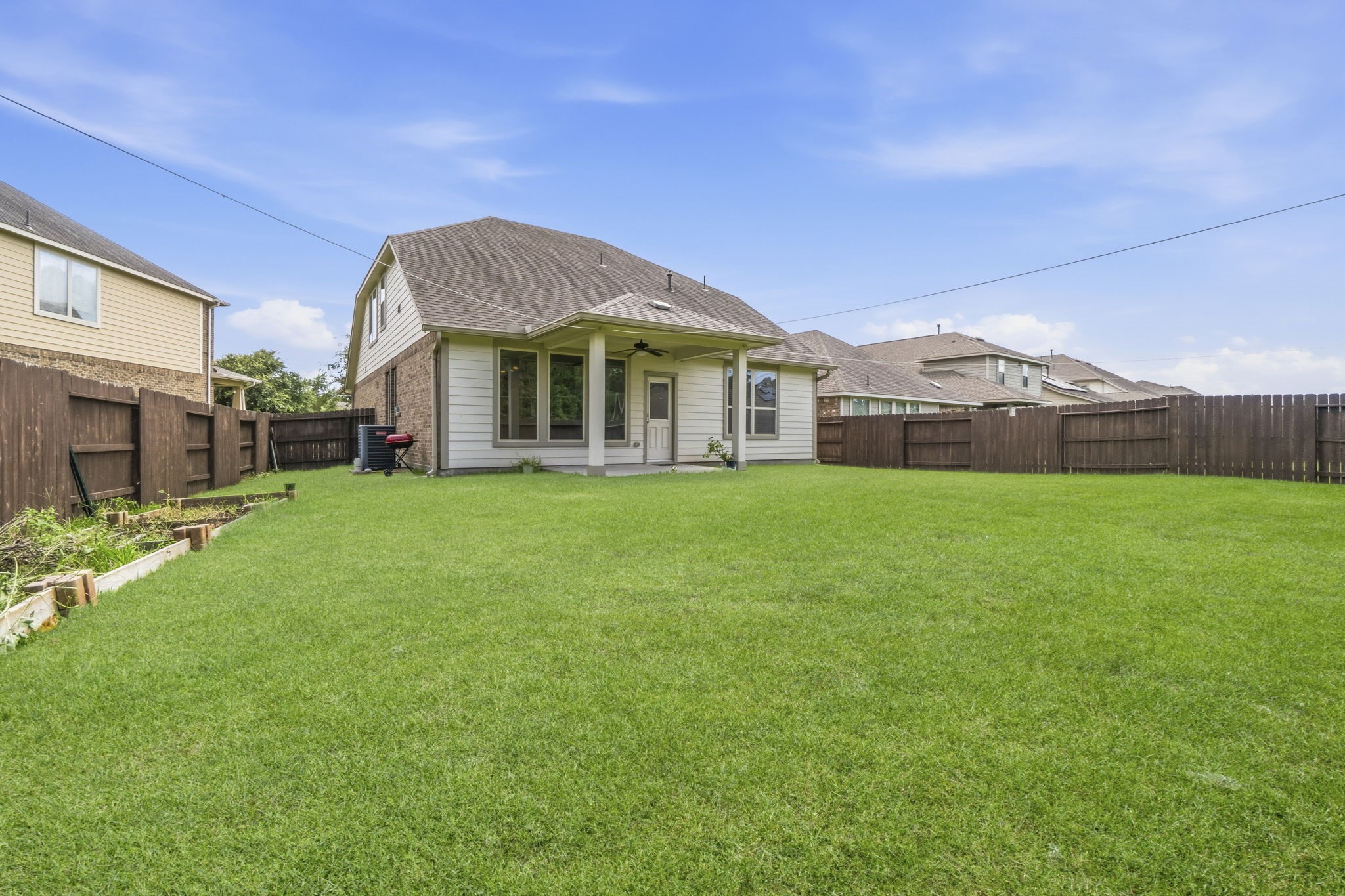 4551 Overlook Bend Drive Spring, TX 77386 - Photo 20 of 21 large yard and patio with no back neighbors