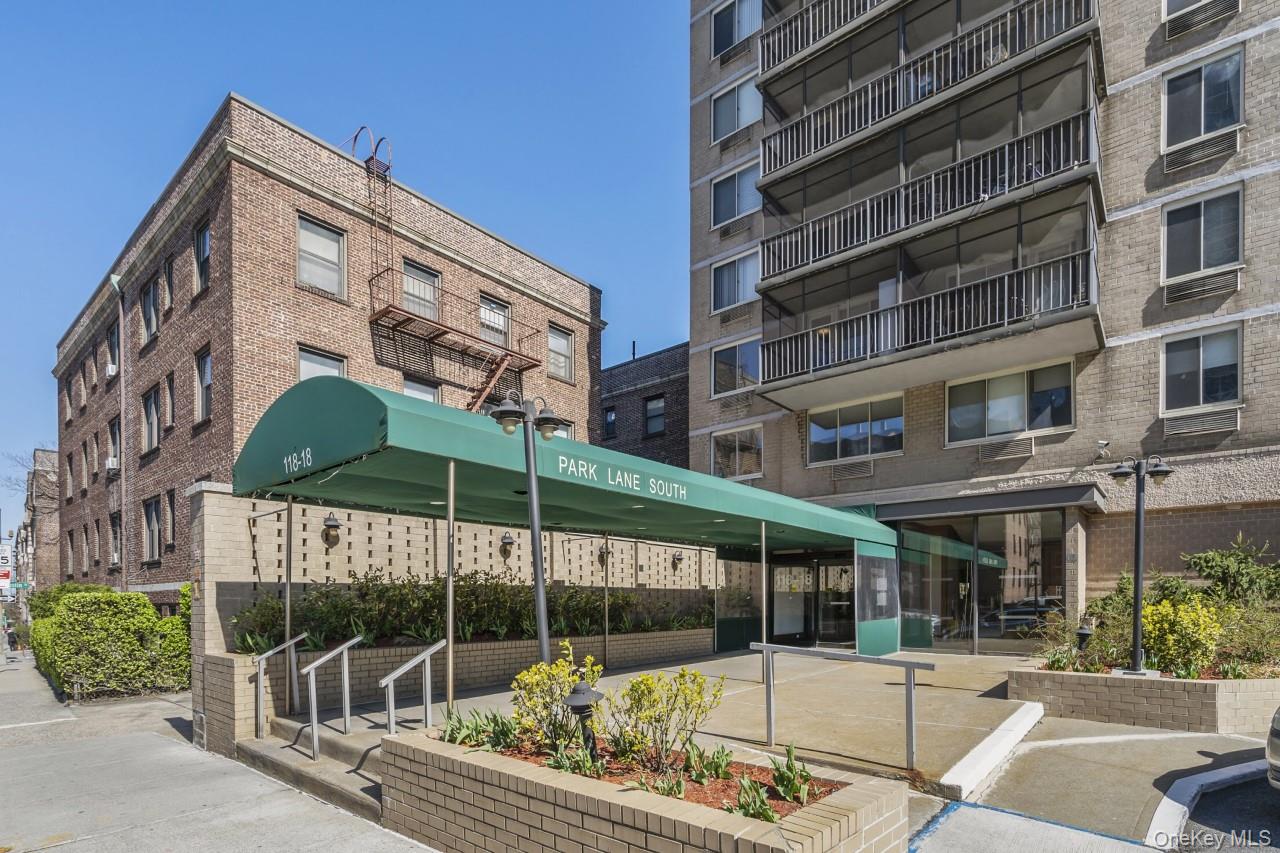 118-18 Union Turnpike, Unit 19G Queens, NY 11415 - Photo 16 of 16 View of apartment building / complex