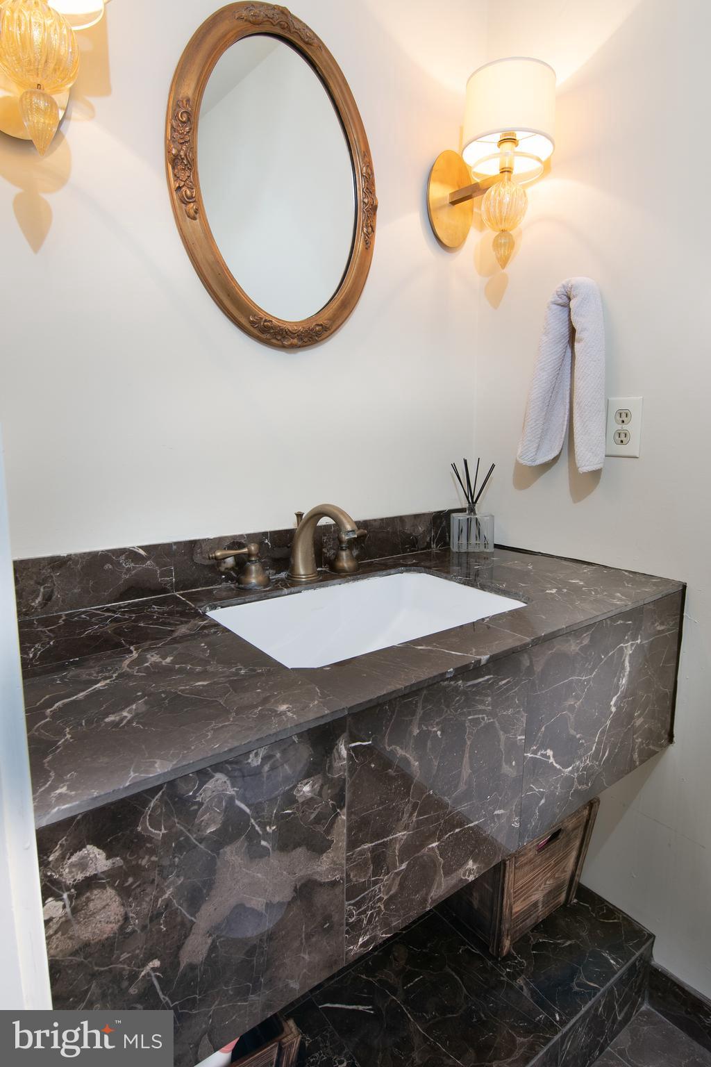 10 Llanfair Road, Unit 6 Ardmore, PA 19003 - Photo 18 of 35 Guest powder room