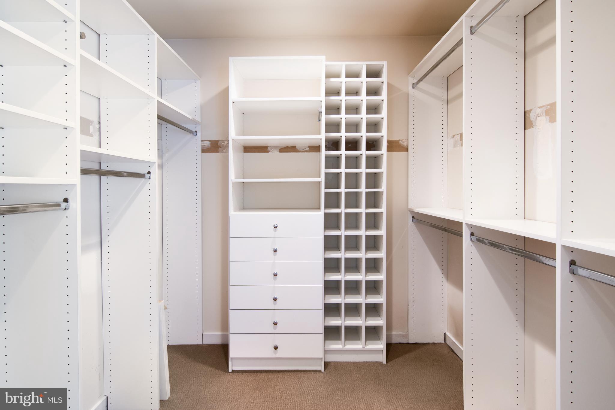 10 Llanfair Road, Unit 6 Ardmore, PA 19003 - Photo 24 of 35 Main Bedroom Walk in Closet beyond dressing closet