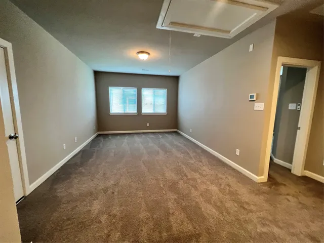 a bathroom with a sink mirror toilet and bathtub