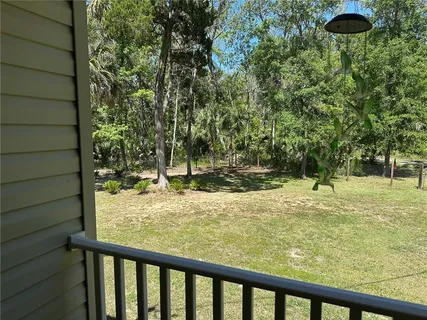 a view of swimming pool from a window