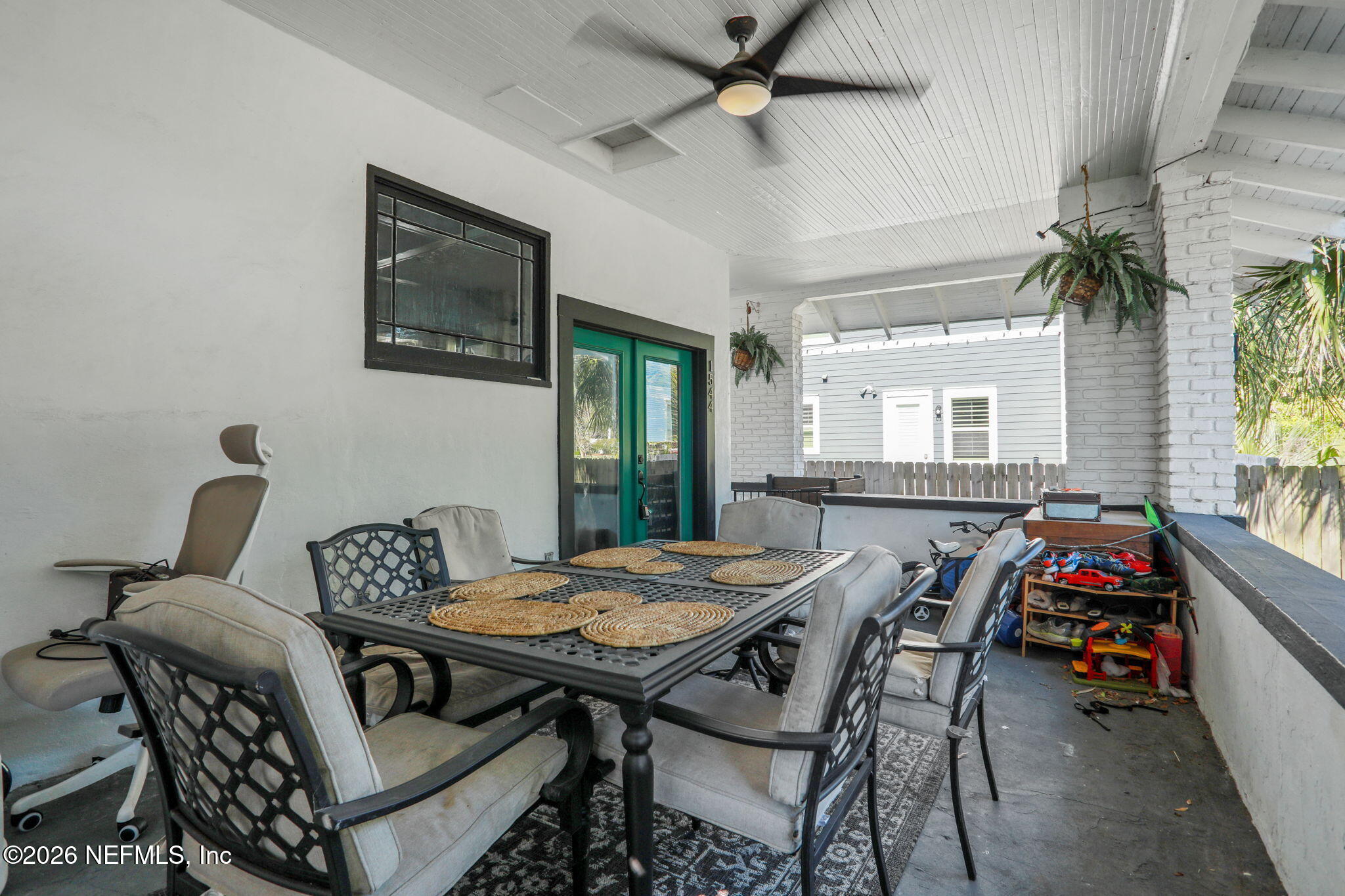 1544 Perry Street Jacksonville, FL 32206 - Photo 11 of 43 a view of a dining room with furniture and a window