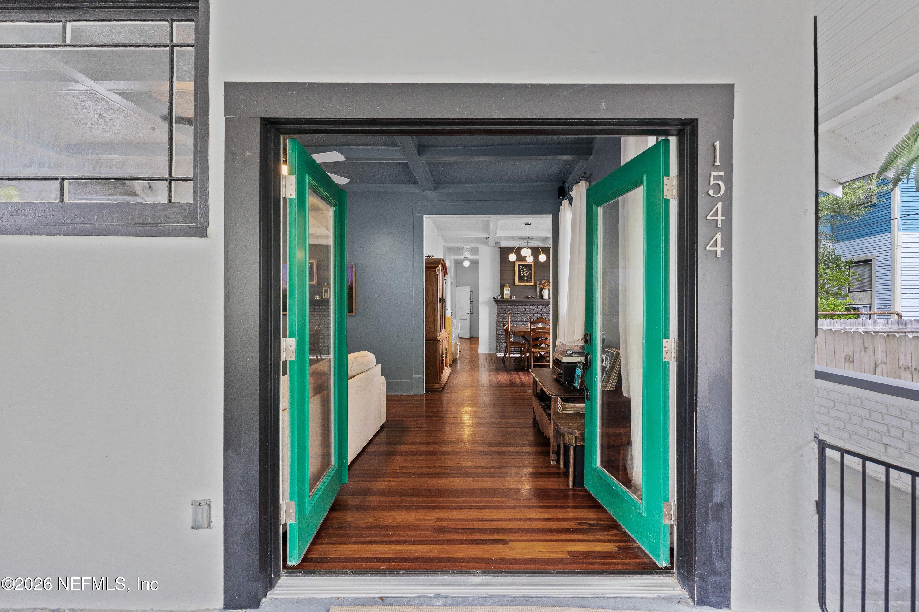 1544 Perry Street Jacksonville, FL 32206 - Photo 12 of 43 a hallway with wooden floor windows and entryway