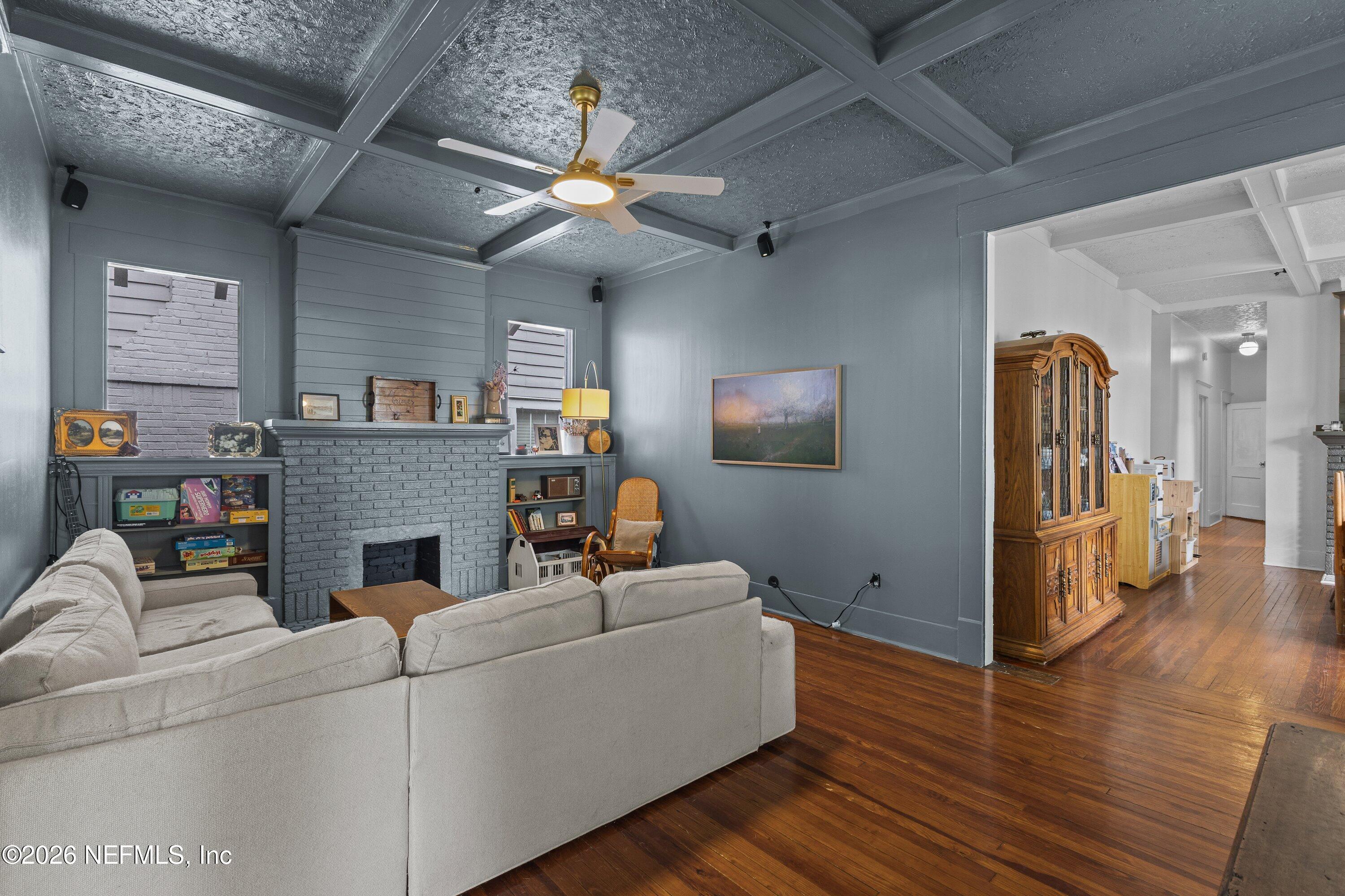 1544 Perry Street Jacksonville, FL 32206 - Photo 15 of 43 a living room with furniture and a fireplace