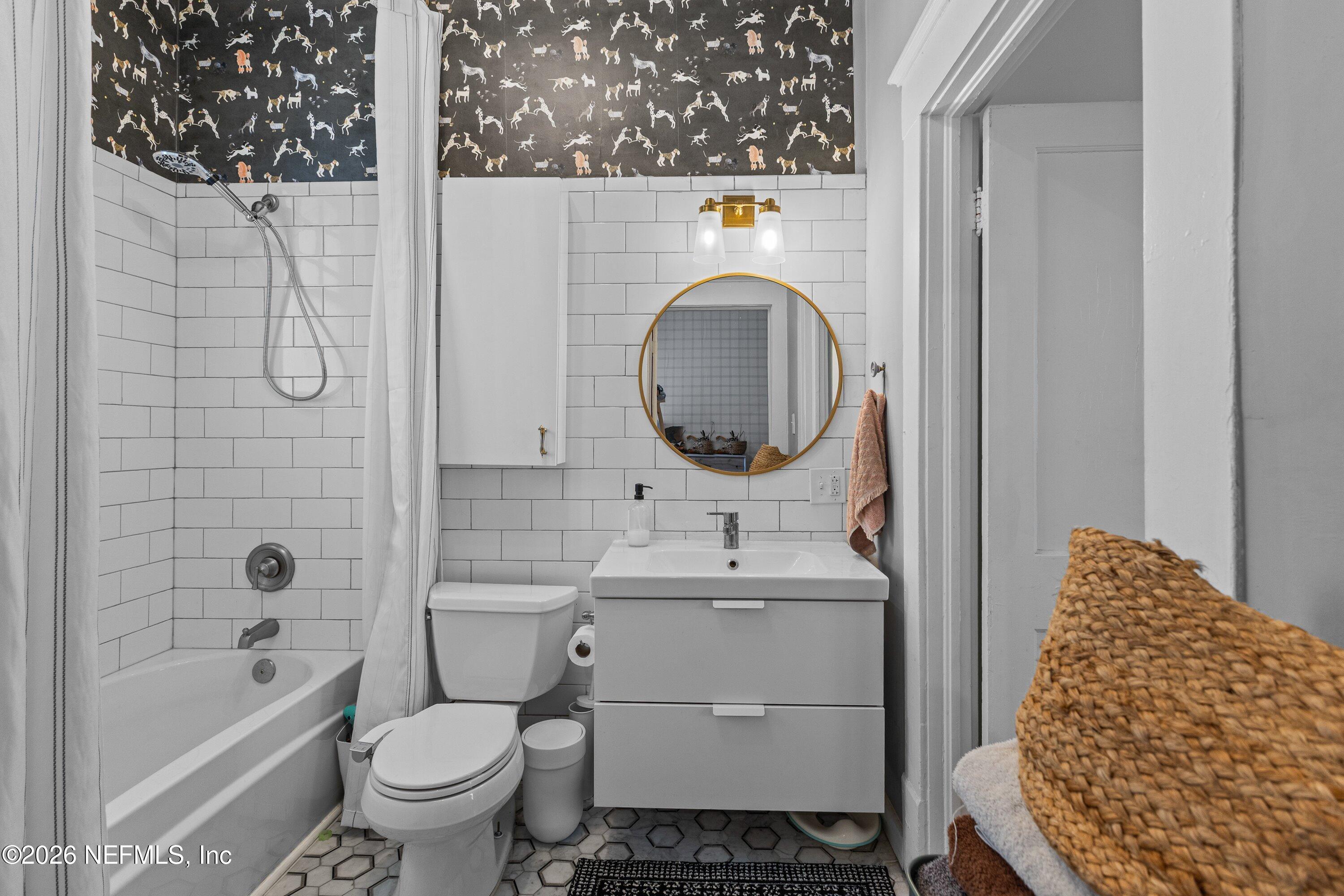 1544 Perry Street Jacksonville, FL 32206 - Photo 34 of 43 a bathroom with a sink toilet and shower