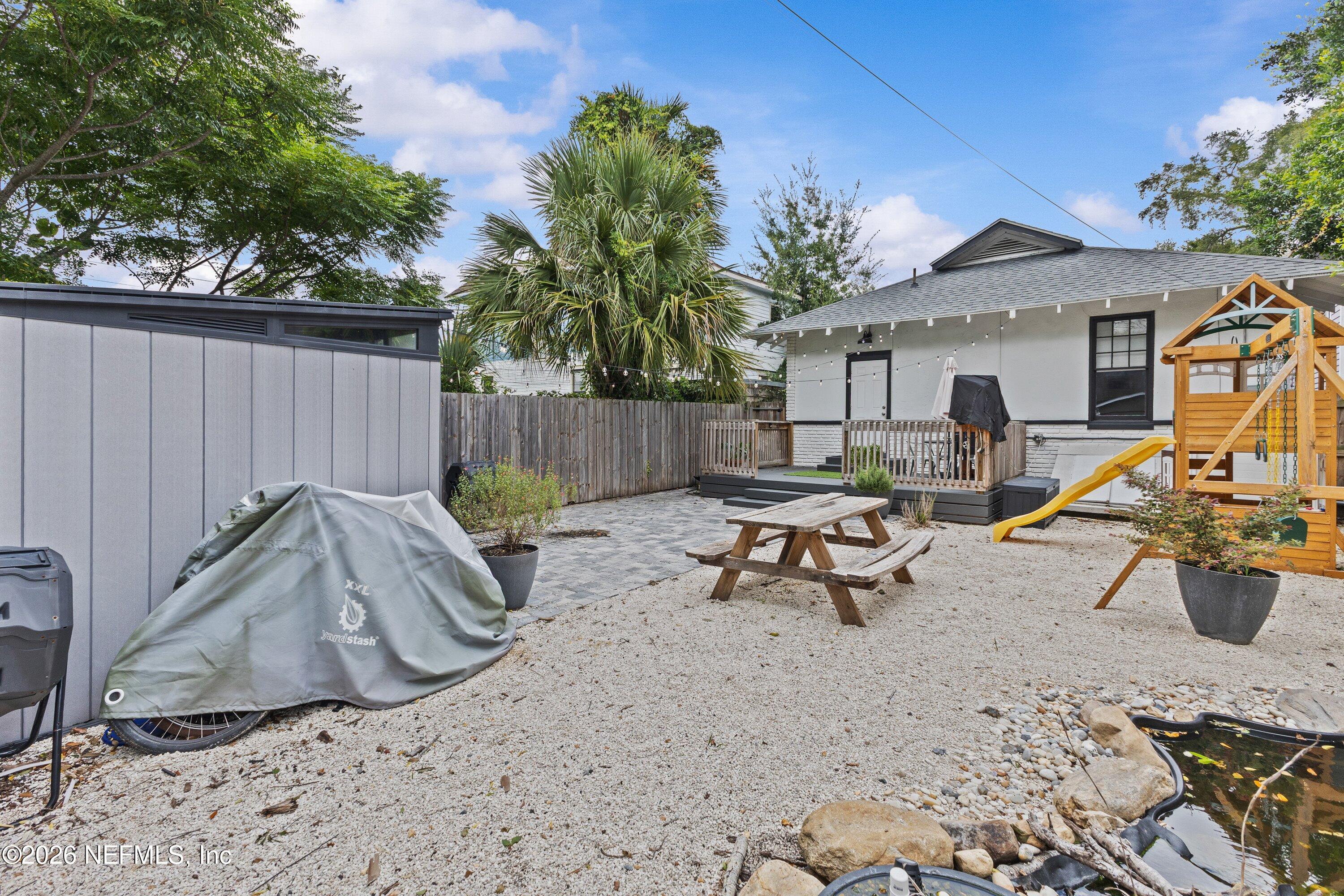 1544 Perry Street Jacksonville, FL 32206 - Photo 40 of 43 a view of a backyard with a sitting area