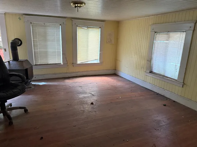 an empty room with windows