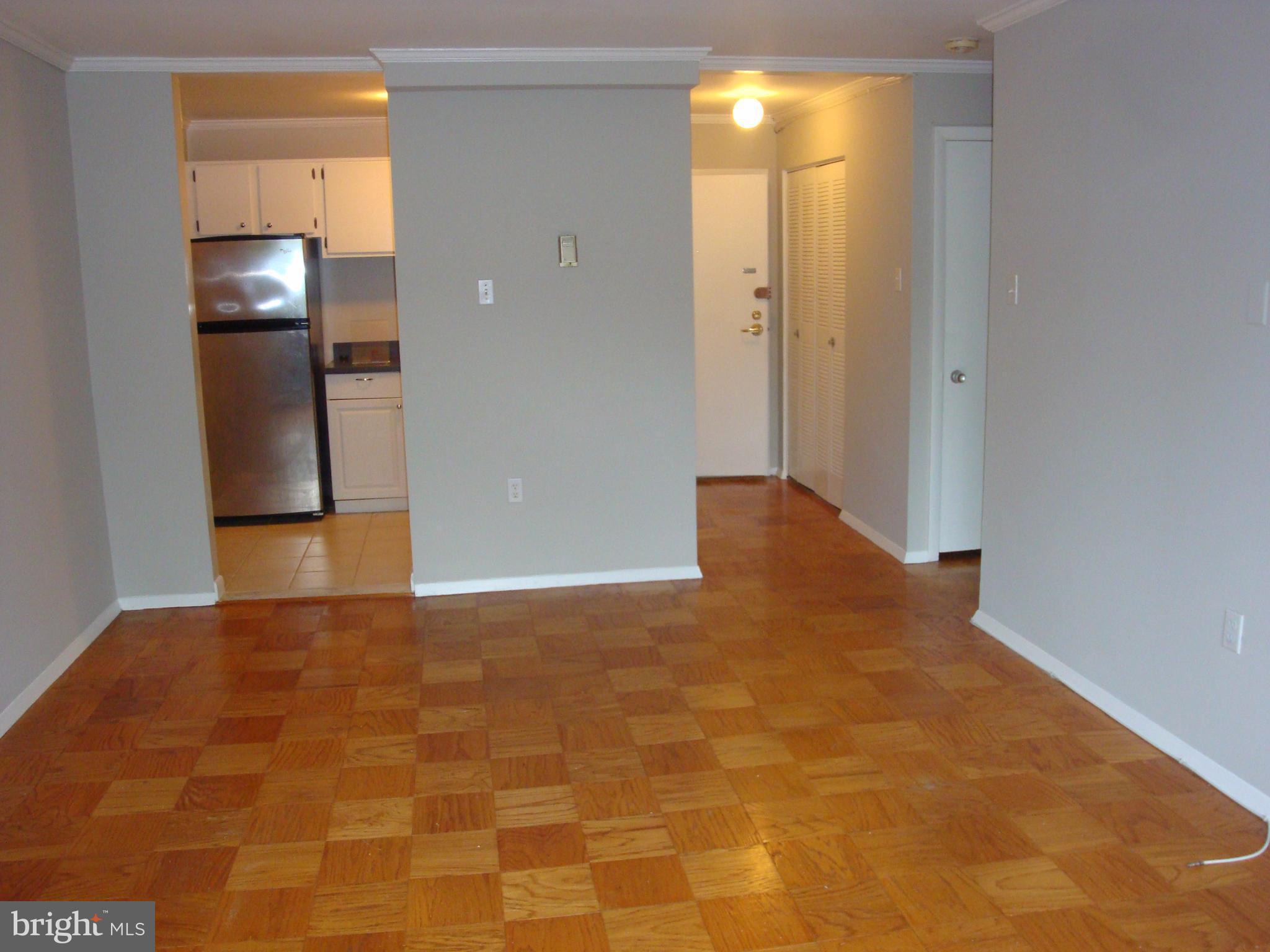 4555 MacArthur Boulevard Northwest, Unit 202 Washington, DC 20007 - Photo 5 of 14 Dining Room-View to Kitchen