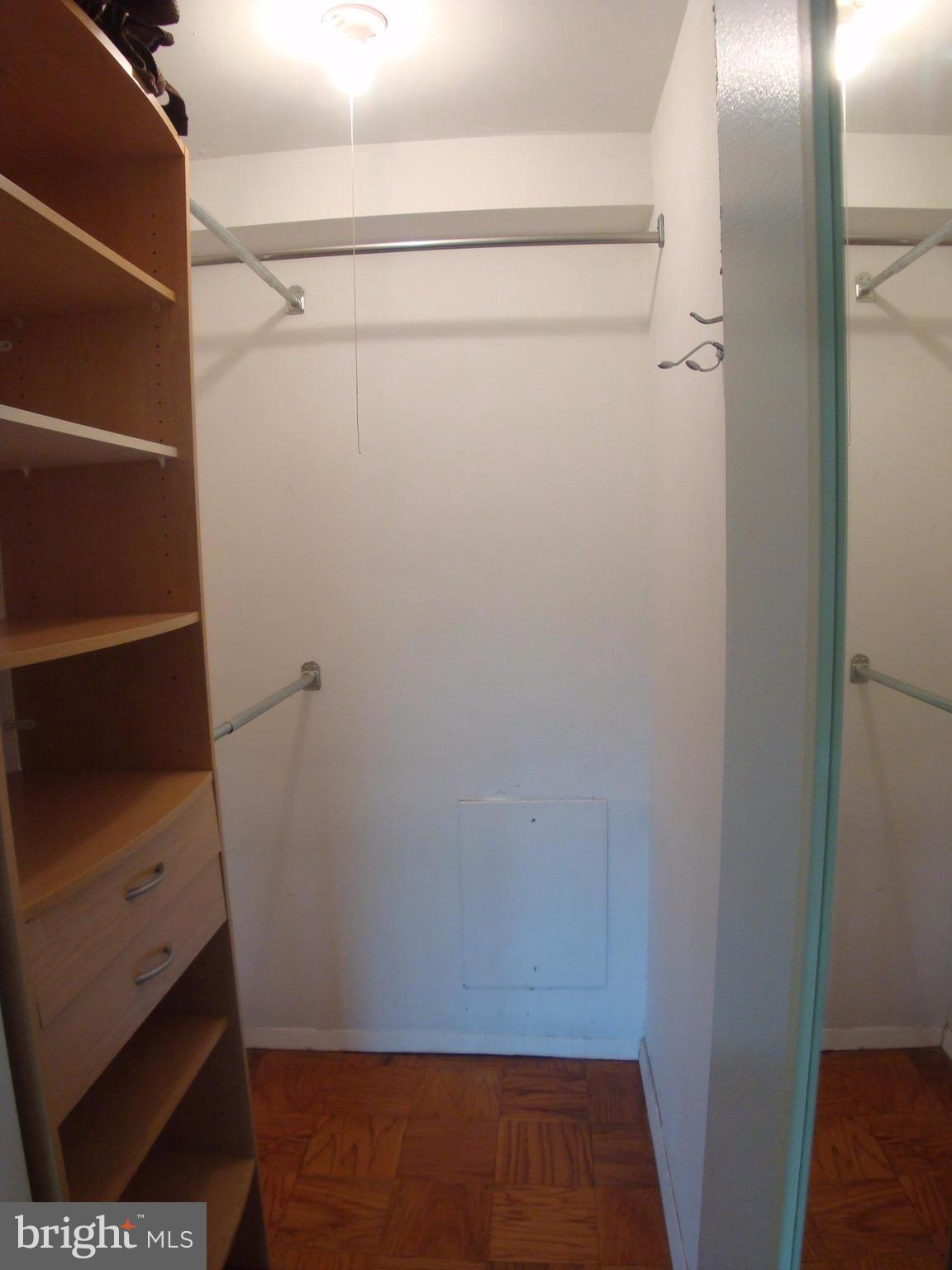 4555 MacArthur Boulevard Northwest, Unit 202 Washington, DC 20007 - Photo 7 of 14 Large Walk-in Closet/Shelving in Bedroom