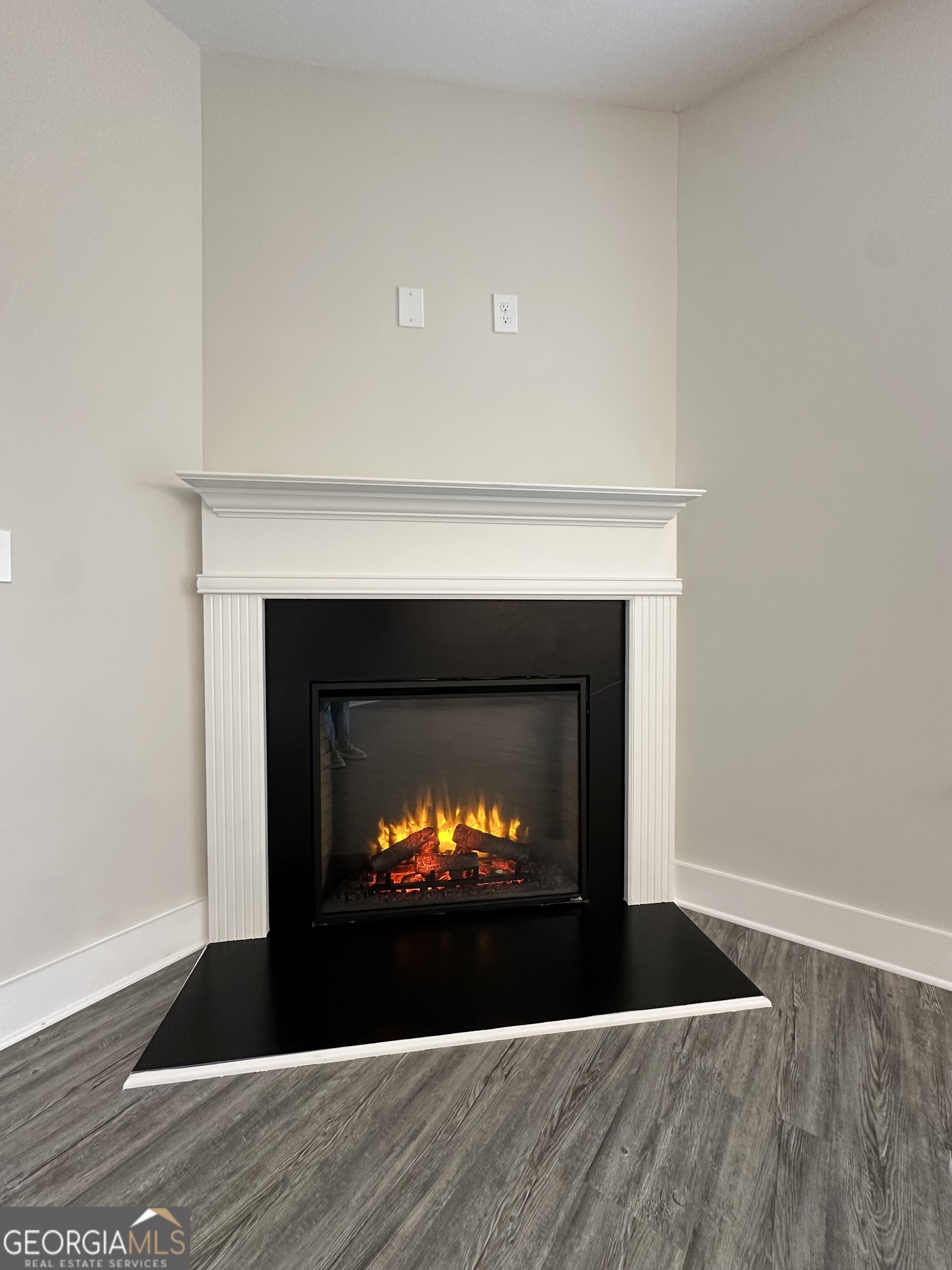 11209 Cornerstone Lane Hampton, GA 30228 - Photo 12 of 38 a room with a fireplace