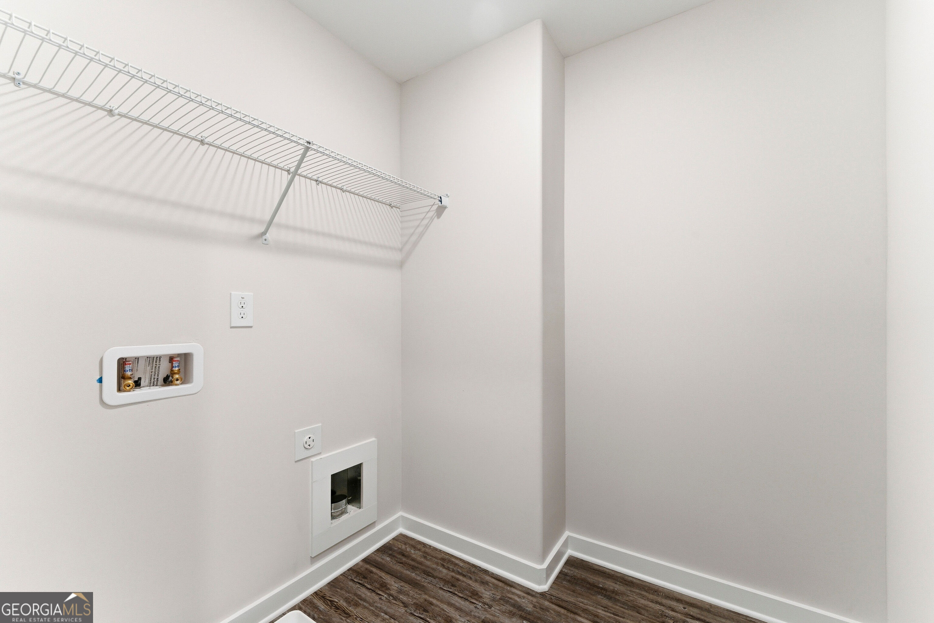 11209 Cornerstone Lane Hampton, GA 30228 - Photo 27 of 38 a view of utility room