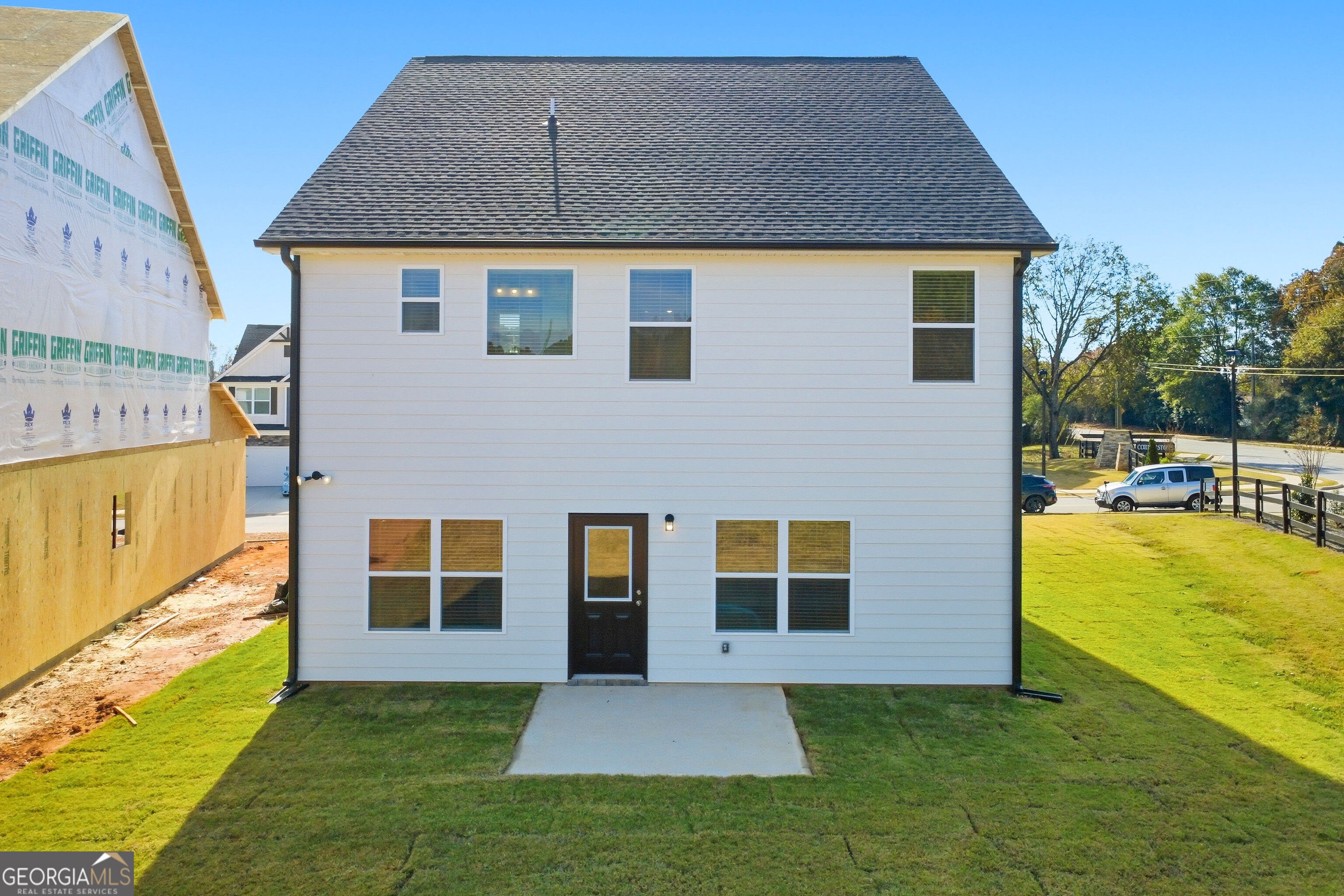 11209 Cornerstone Lane Hampton, GA 30228 - Photo 34 of 38 a front view of a house with a yard