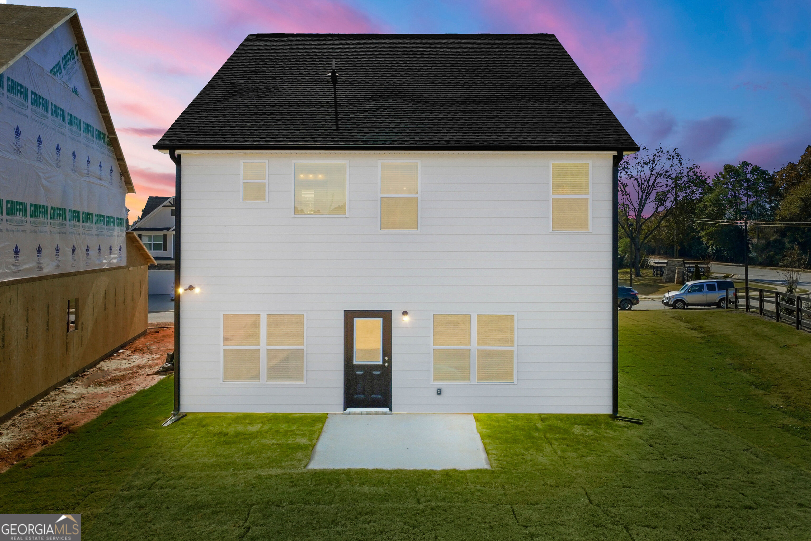 11209 Cornerstone Lane Hampton, GA 30228 - Photo 38 of 38 a front view of a house with garden
