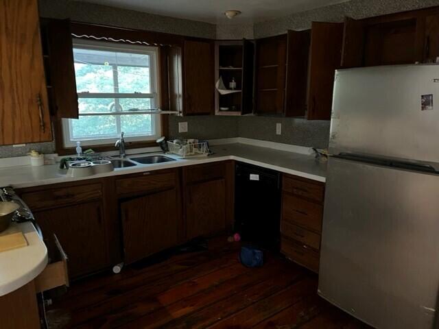 162 Buckskin Path Centerville, MA 02632 - Photo 12 of 16 a kitchen with a sink a window and cabinets