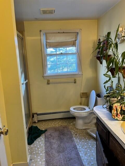 162 Buckskin Path Centerville, MA 02632 - Photo 5 of 16 a bathroom with a toilet a sink and a window