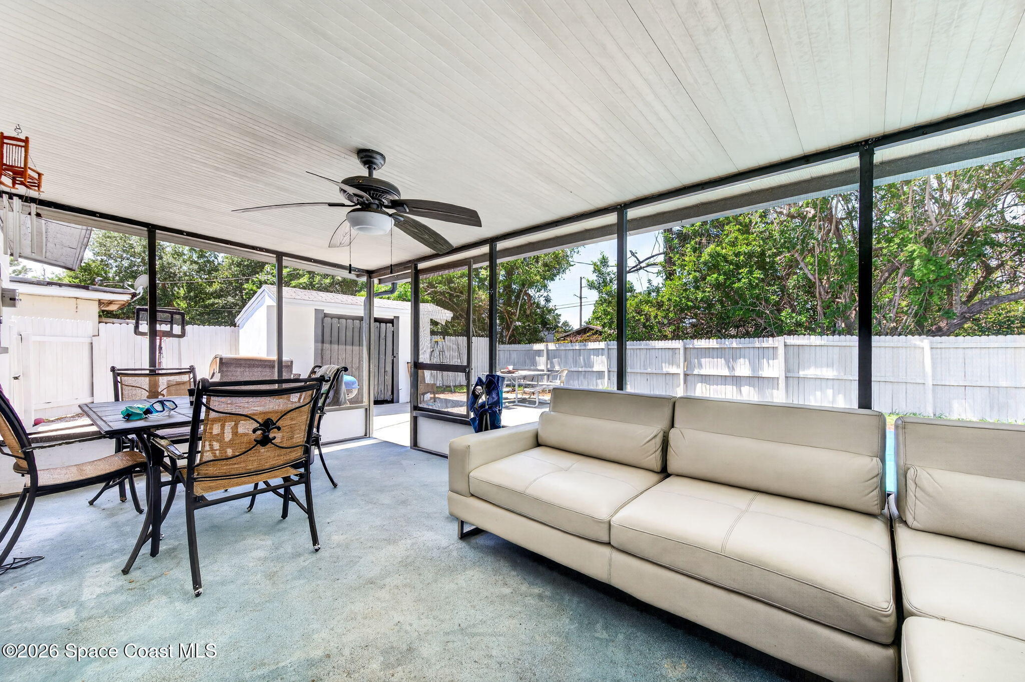 3300 Argyle Road Titusville, FL 32796 - Photo 23 of 29 a living room with furniture and a large window