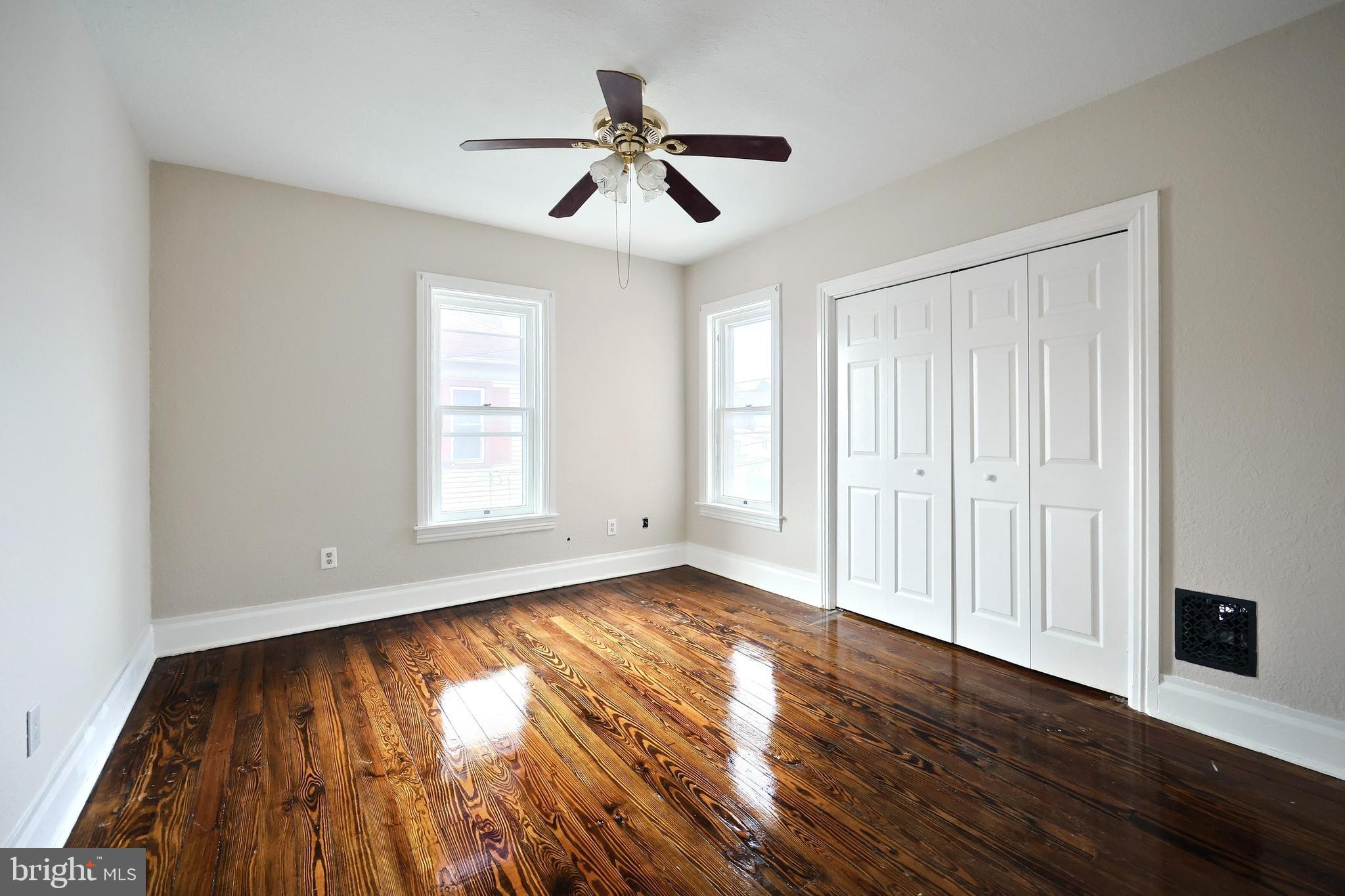 513 Stock Street Hanover, PA 17331 - Photo 24 of 30 a view of empty room with wooden floor and fan