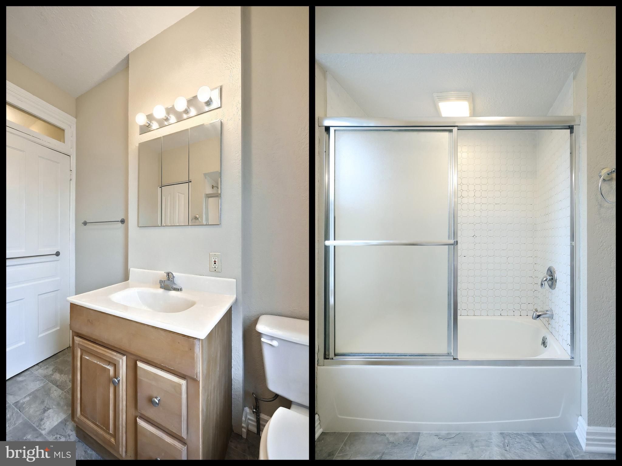 513 Stock Street Hanover, PA 17331 - Photo 29 of 30 a bathroom with a sink mirror and a shower