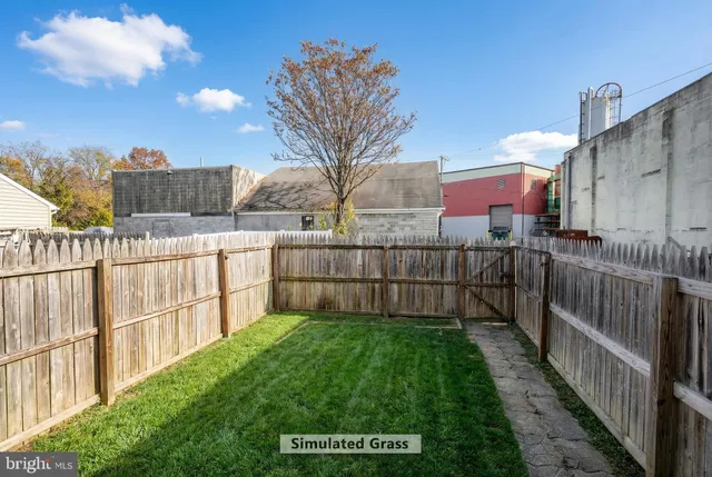 a view of a wooden fence
