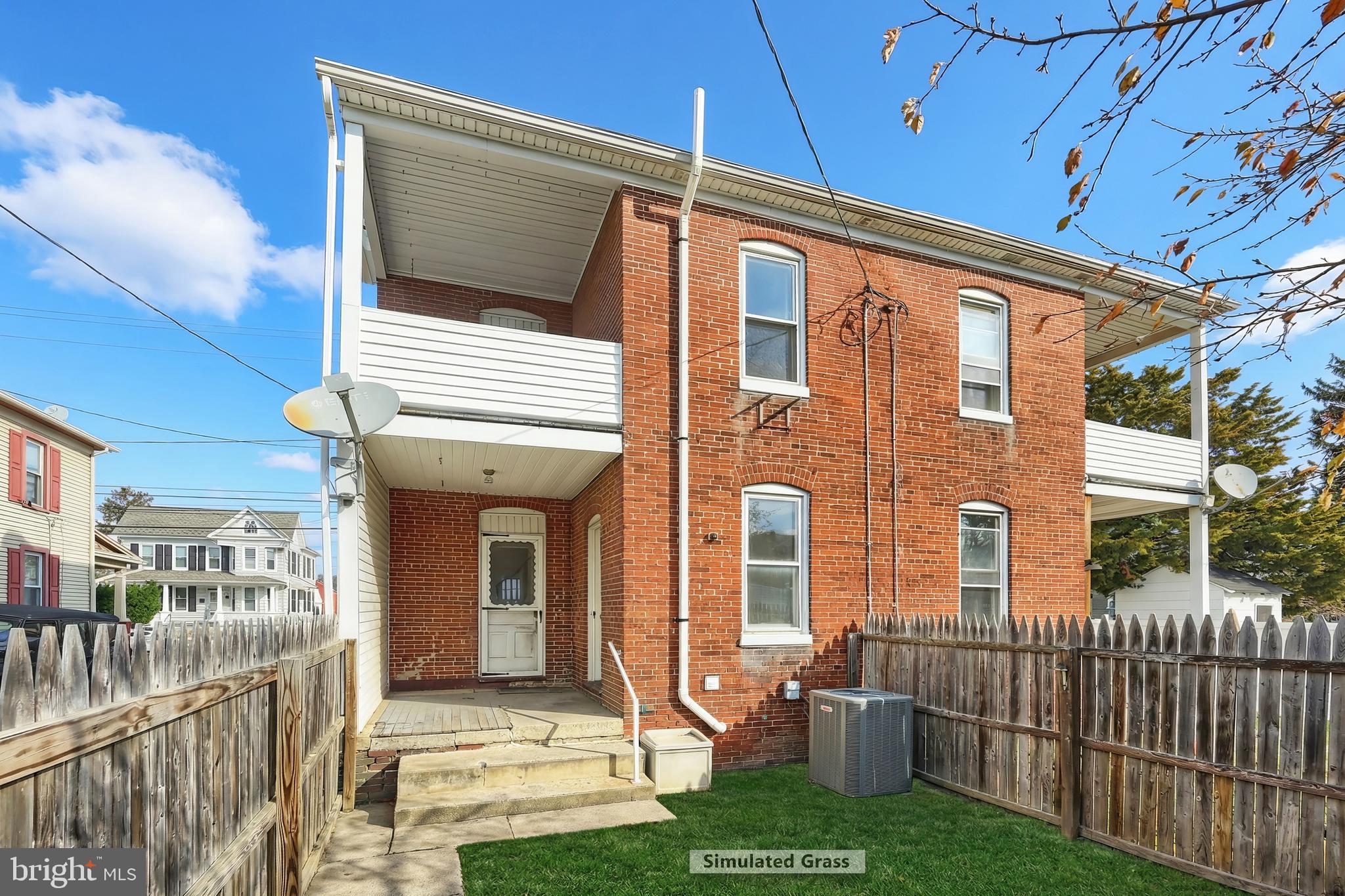 513 Stock Street Hanover, PA 17331 - Photo 5 of 30 a front view of a house with a yard