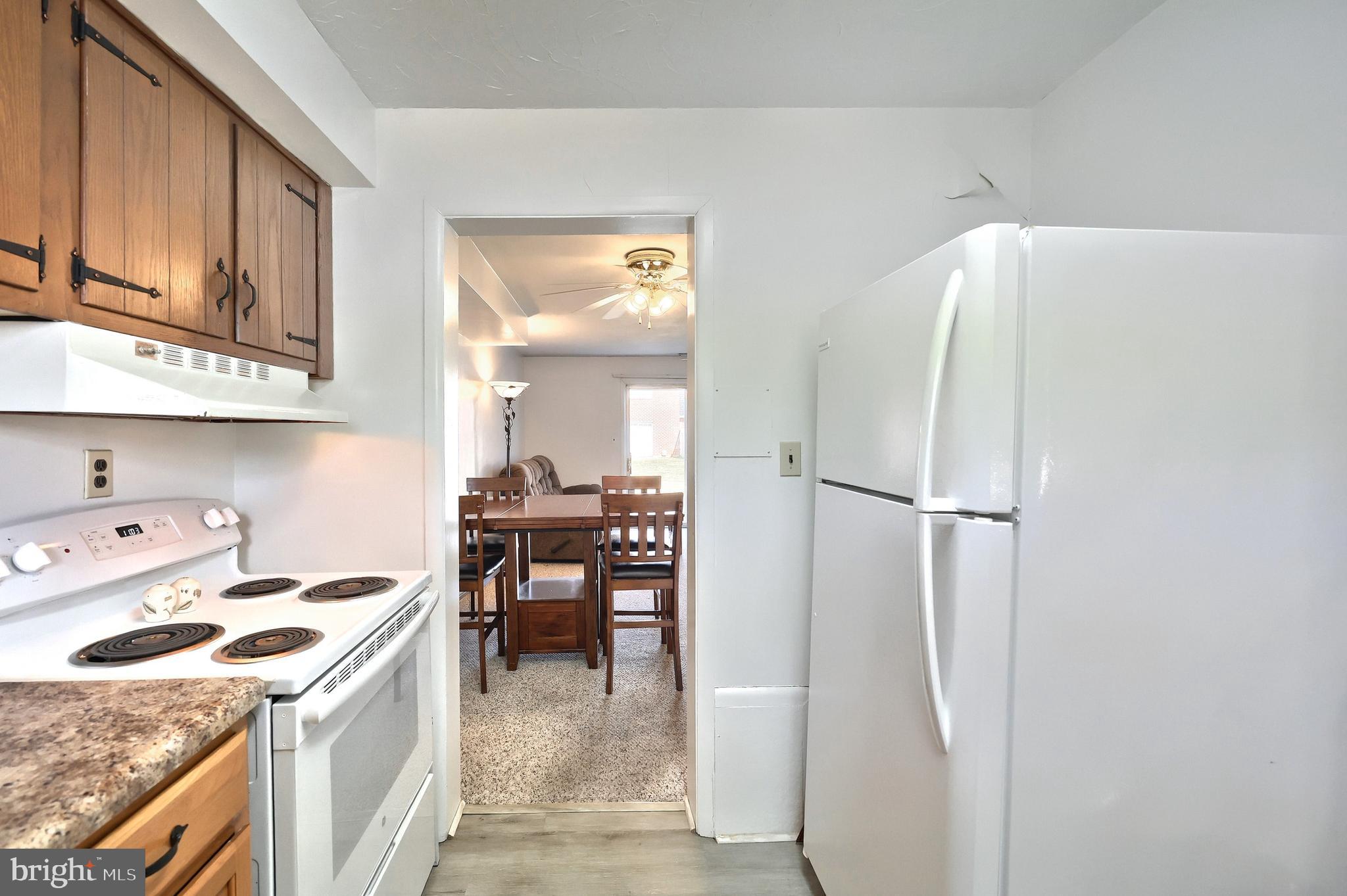 1640 Devers Road, Unit D York, PA 17404 - Photo 11 of 22 a kitchen with a refrigerator a stove and a cabinets