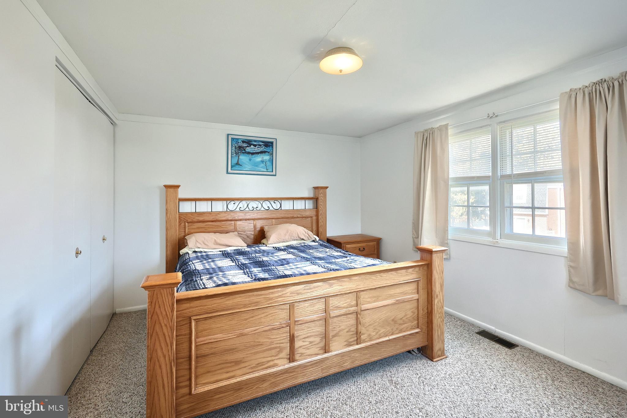 1640 Devers Road, Unit D York, PA 17404 - Photo 19 of 22 a bed sitting in a bedroom next to a window