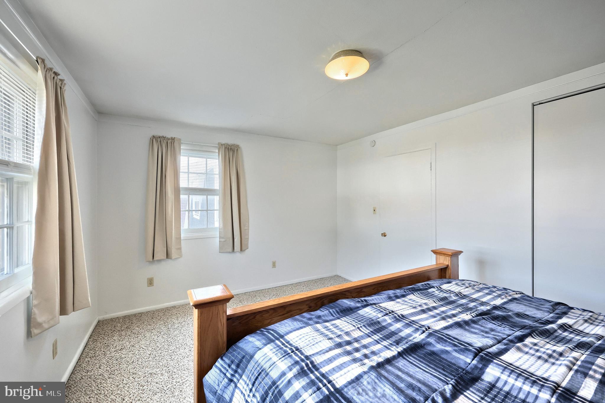 1640 Devers Road, Unit D York, PA 17404 - Photo 20 of 22 a bedroom with a bed and window