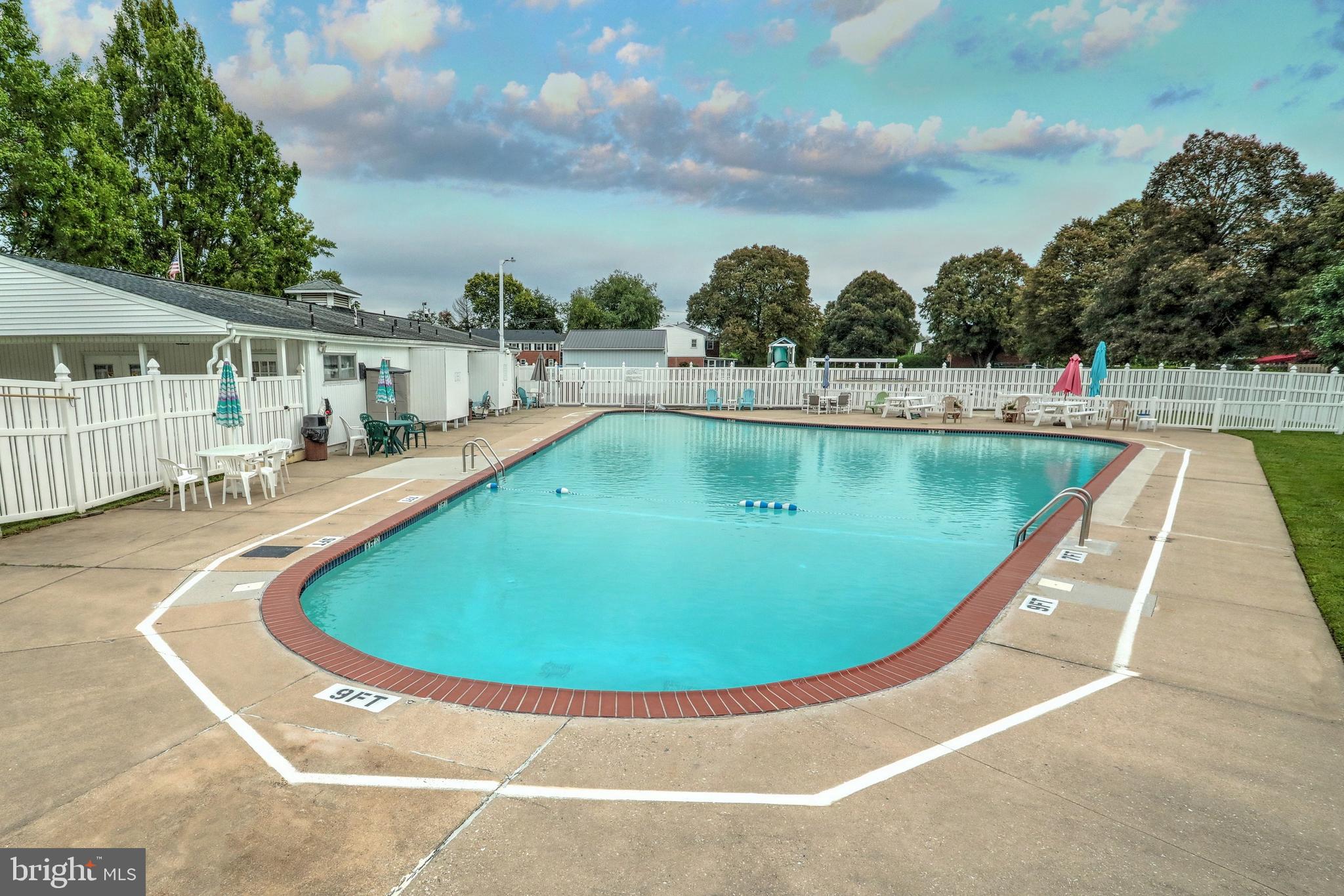 1640 Devers Road, Unit D York, PA 17404 - Photo 7 of 22 a view of a swimming pool with a yard