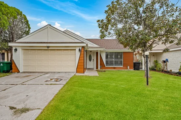 front view of a house and a yard