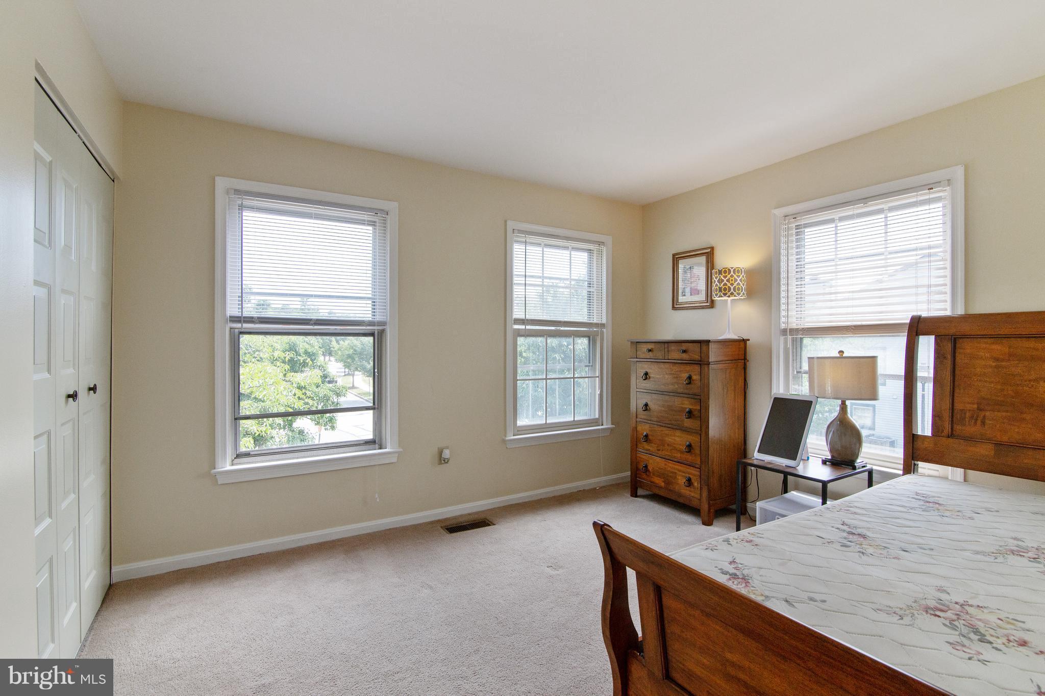 9304 Palmer Place, Unit 5 Laurel, MD 20708 - Photo 28 of 30 a view of a workspace with furniture and a window