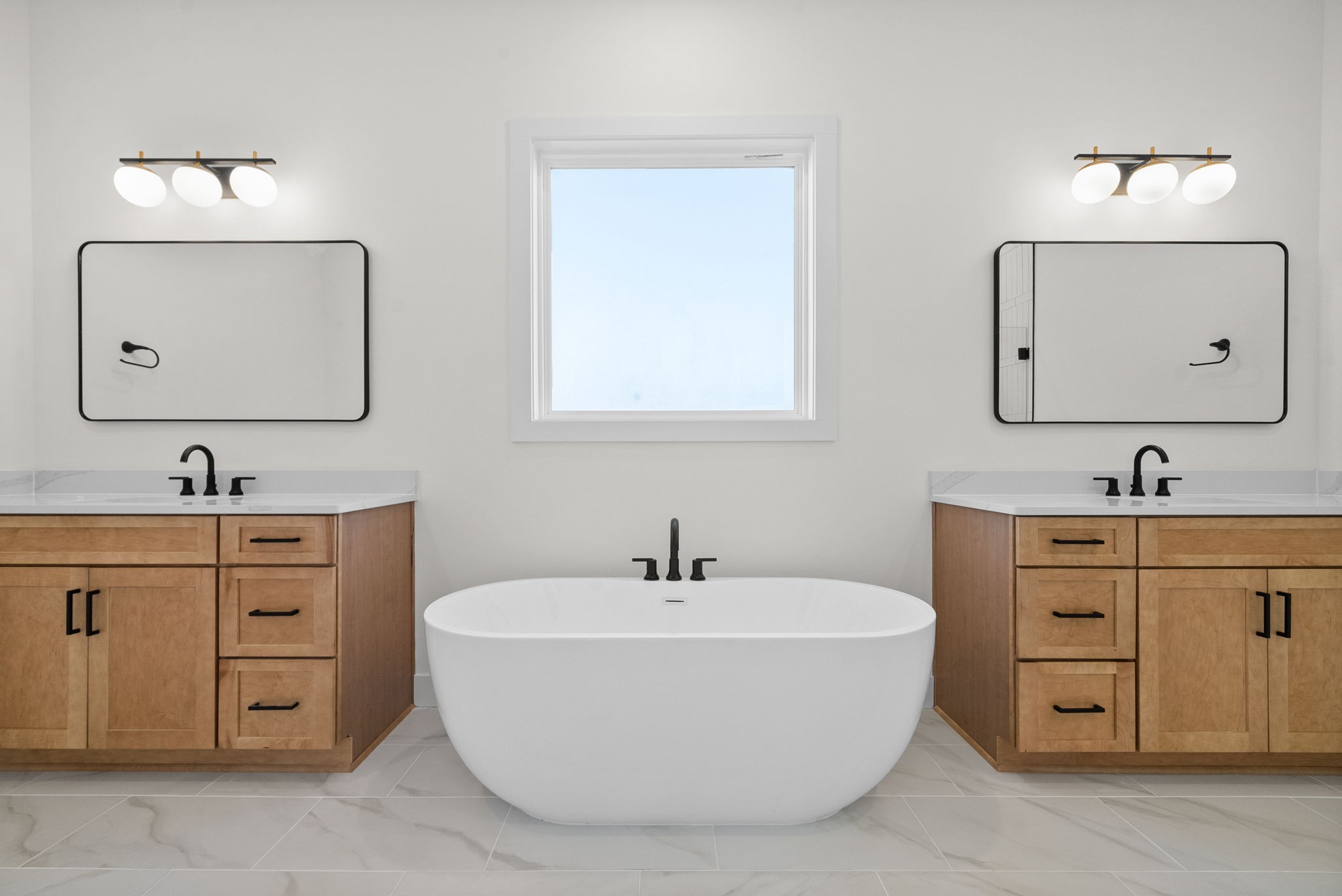 1120 Jacobs Court Joelton, TN 37080 - Photo 21 of 44 a bathroom with a double vanity sink mirror and bathtub