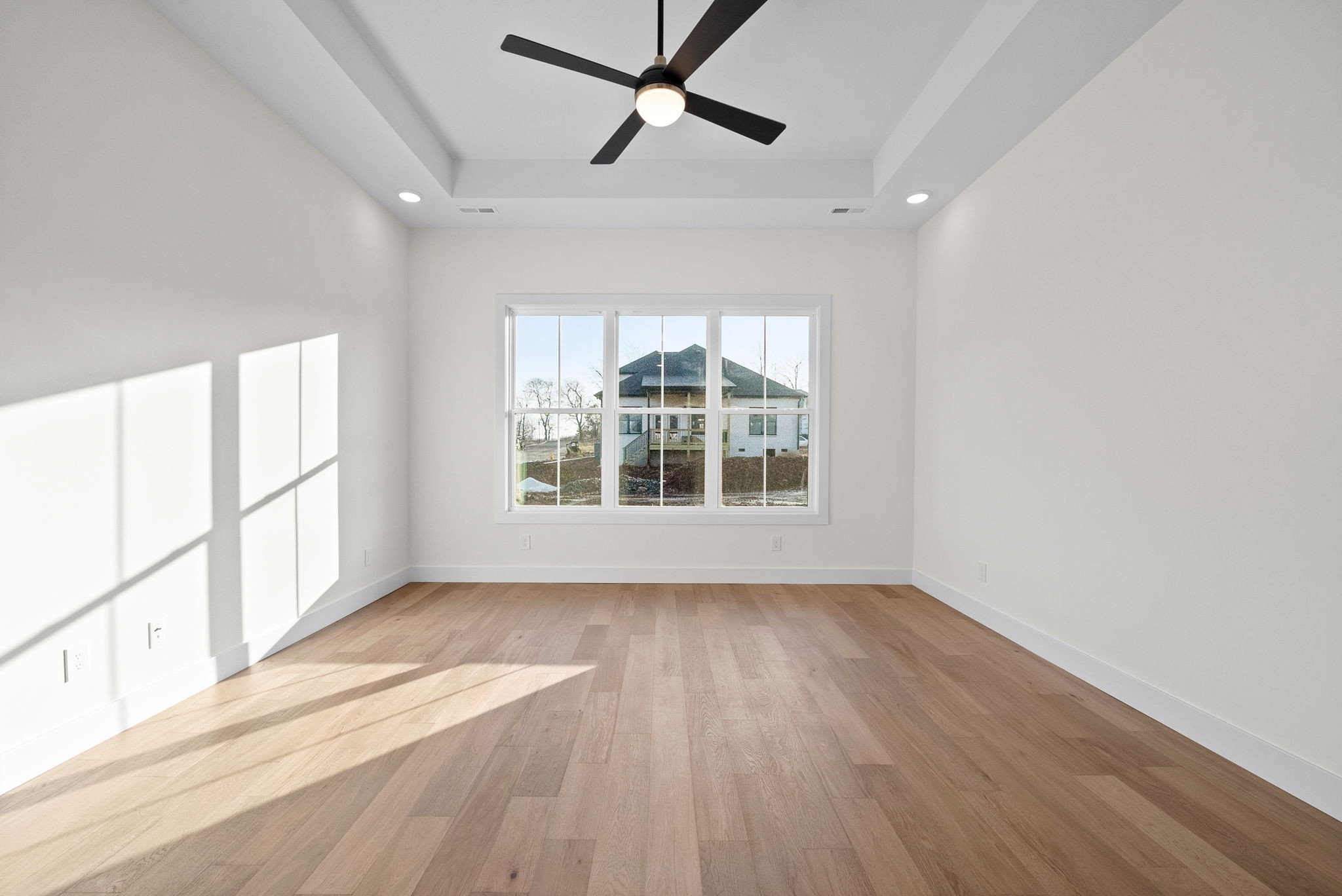 1120 Jacobs Court Joelton, TN 37080 - Photo 30 of 44 wooden floor in an empty room with a window