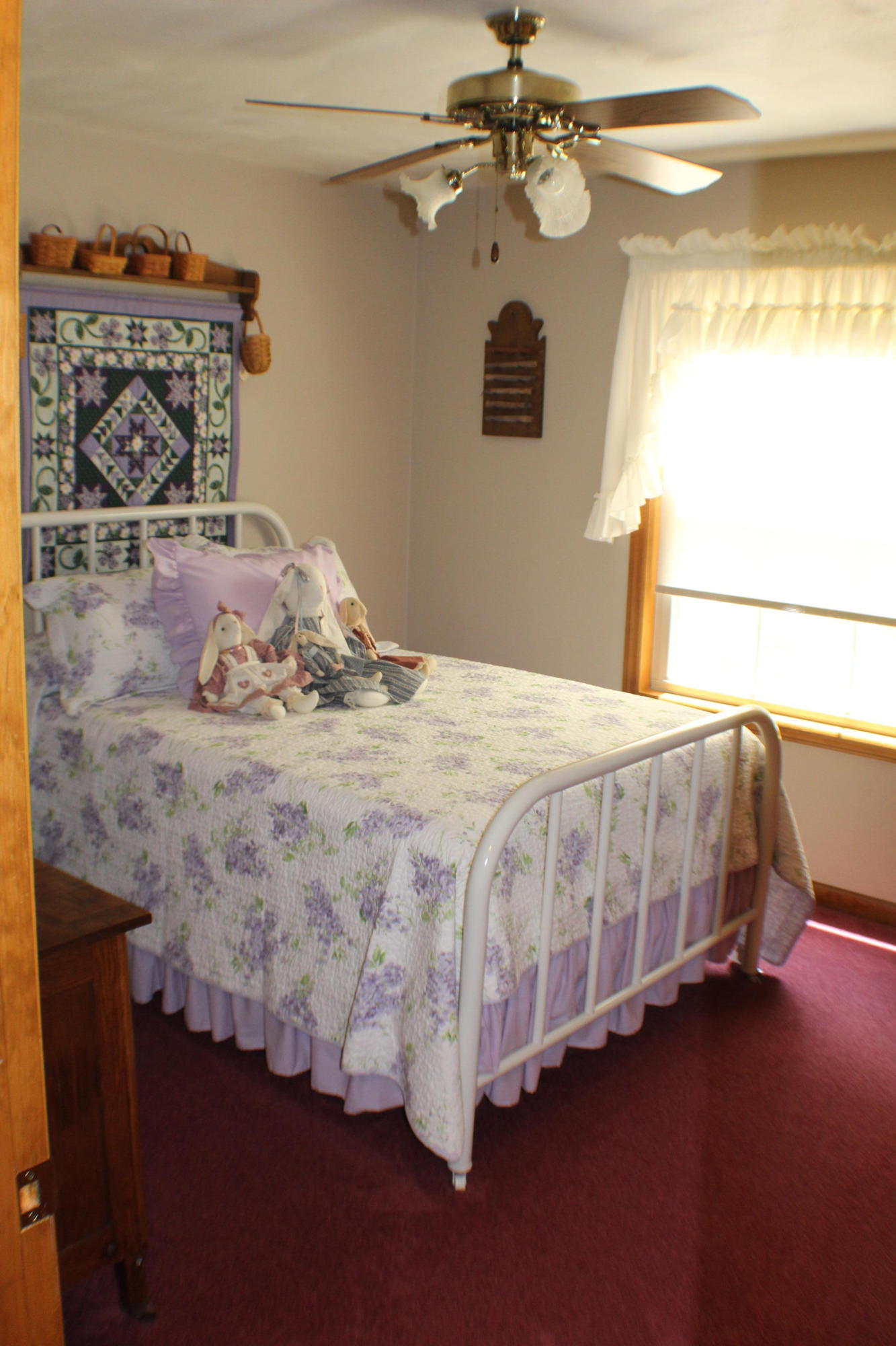 1134 Woodhaven Estates Road Blue Ridge, VA 24064 - Photo 50 of 60 a bedroom with a bed dresser and window