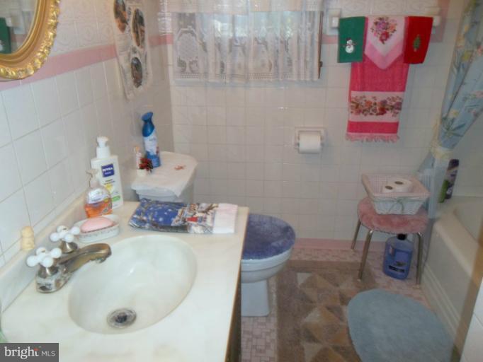 3221 East Joppa Road Baltimore, MD 21234 - Photo 17 of 25 First Floor Bath Has Heat Lamp