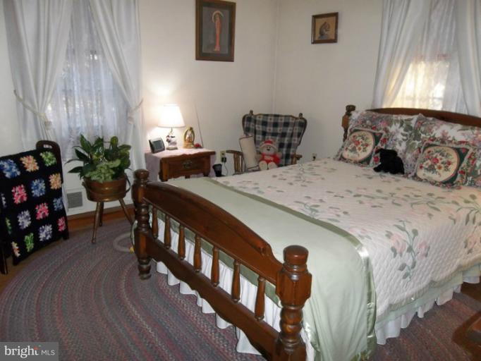 3221 East Joppa Road Baltimore, MD 21234 - Photo 6 of 25 Master Bedroom With Hardwood Floors