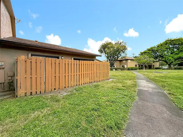 a house view with a garden space