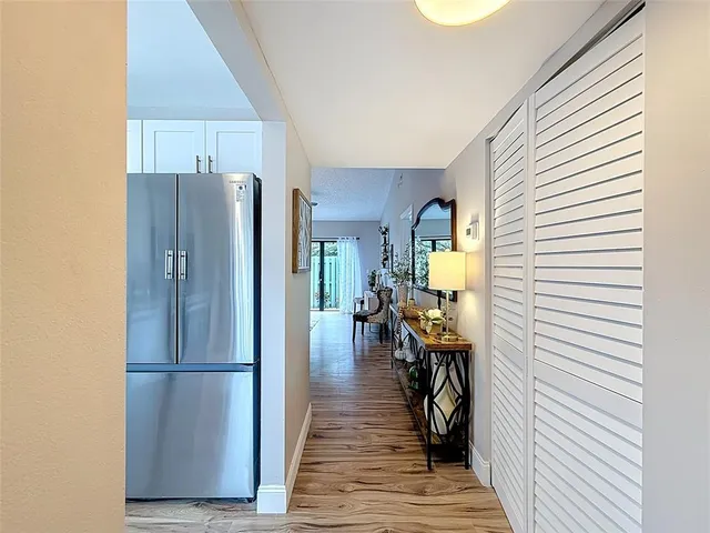 a view of a livingroom with furniture and wooden floor