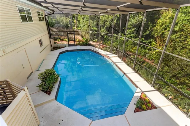 a kitchen with stainless steel appliances granite countertop a sink and a counter
