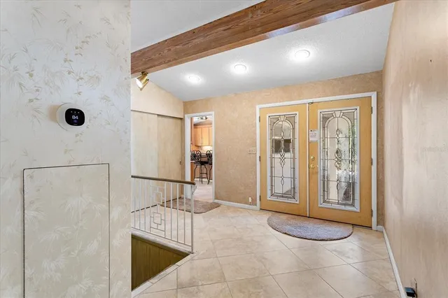 a view of a hallway with bathroom