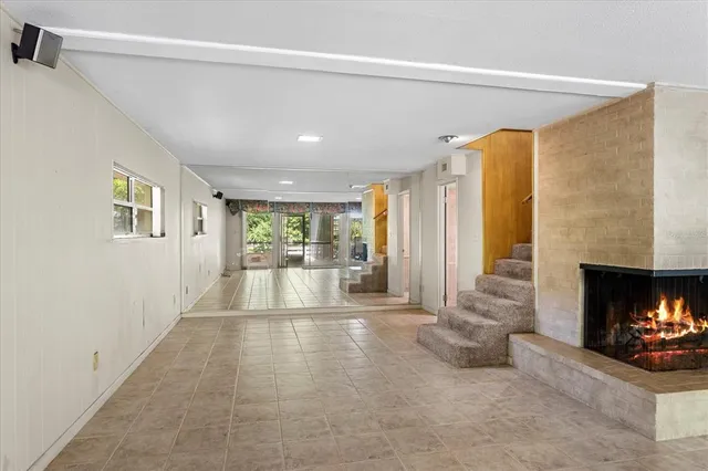 a kitchen with a sink and refrigerator