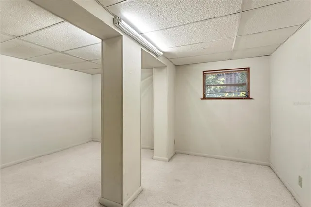 a view of backyard with sitting area