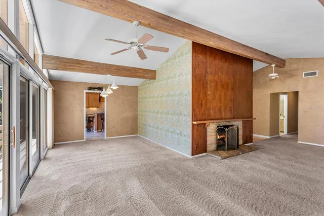 a view of a livingroom with a staircase