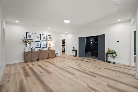 a view of a bedroom with a furniture and closet