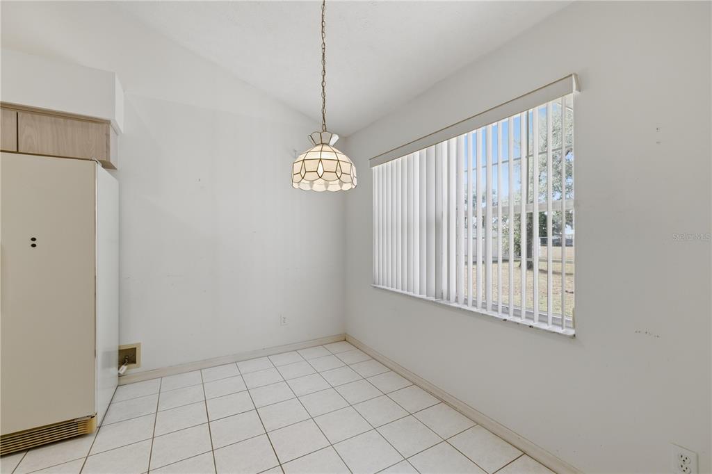 10660 Southwest 73rd Avenue Ocala, FL 34476 - Photo 23 of 37 a view of an empty room with a window