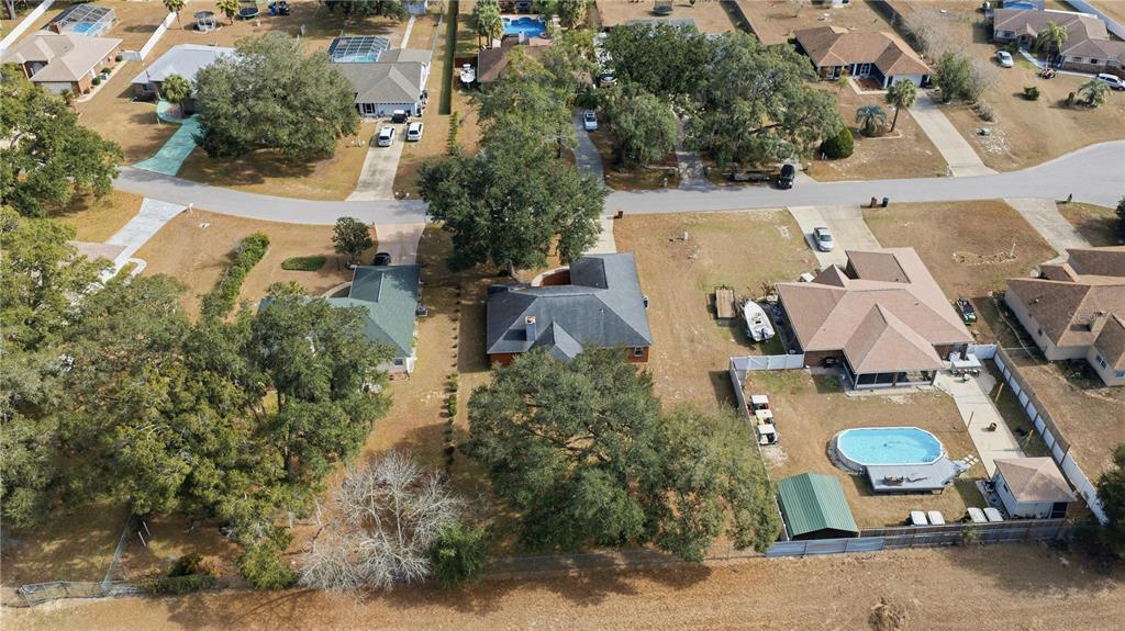 10660 Southwest 73rd Avenue Ocala, FL 34476 - Photo 33 of 37 an aerial view of residential house with parking space