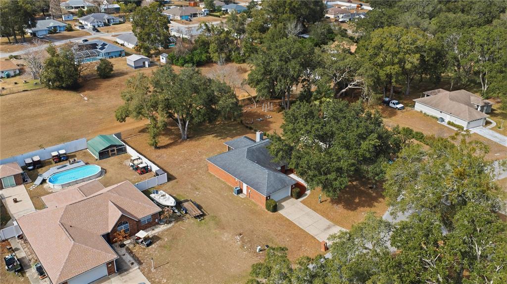 10660 Southwest 73rd Avenue Ocala, FL 34476 - Photo 36 of 37 an aerial view of residential house with outdoor space