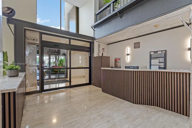 a living room with patio furniture