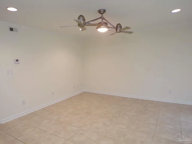 a view of a room with a fan