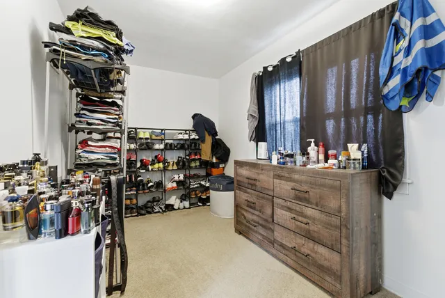 a view of a closet with storage